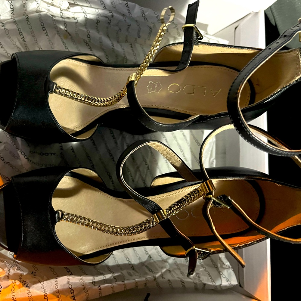 Size 7 black wedge Aldo shoes with original tag on never worn, still in the box